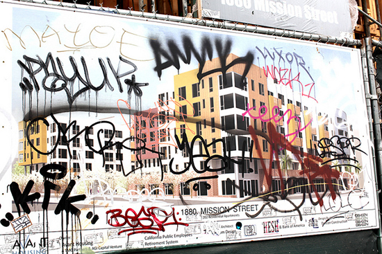 Graffiti on a development rendering in San Francisco's Mission District. Photo by Flickr user Torbakhopper.