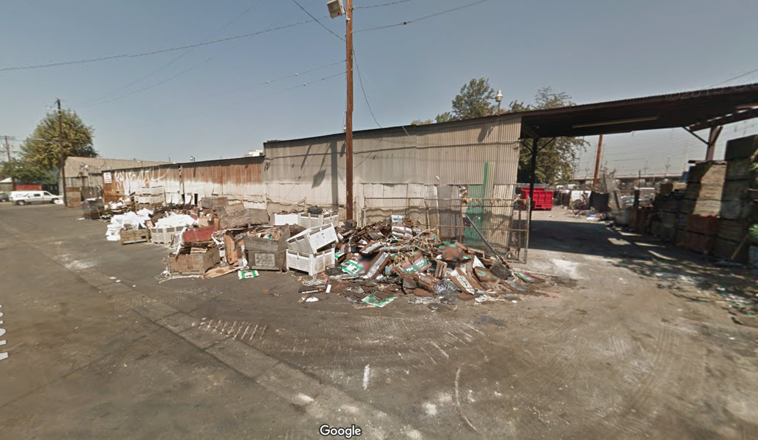 If Measure S passes, it would indefinitely stop the redevelopment of this literal trash heap at 2117 E Violet St into 509 new apartments, including 76 units affordable to low-income households. Image source: Google Maps.